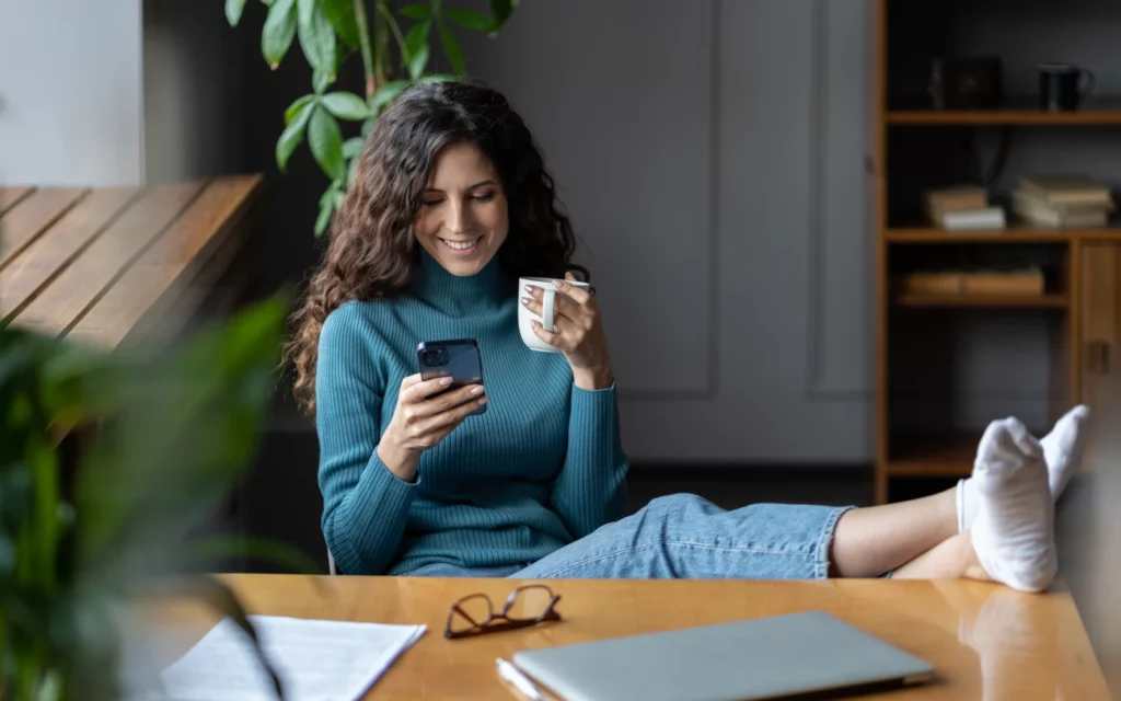 Remote worker girl scrolling through social media