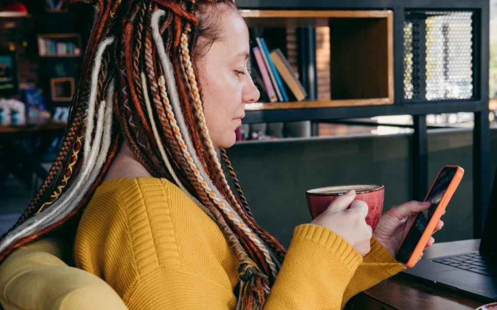 Woman deciding whether to buy Instagram followers