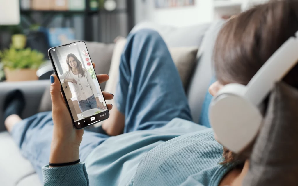 Woman watching Instagram Reels on her phone