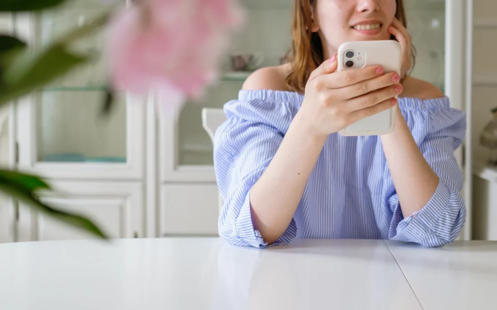 A woman checking an Instagram post