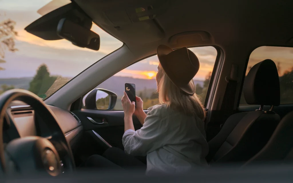 A woman entering her Instagram app and taking the first photo.