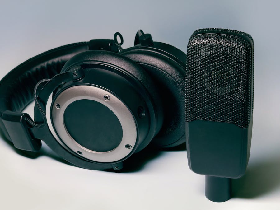 High-quality studio headphones and microphone for professional audio setups.