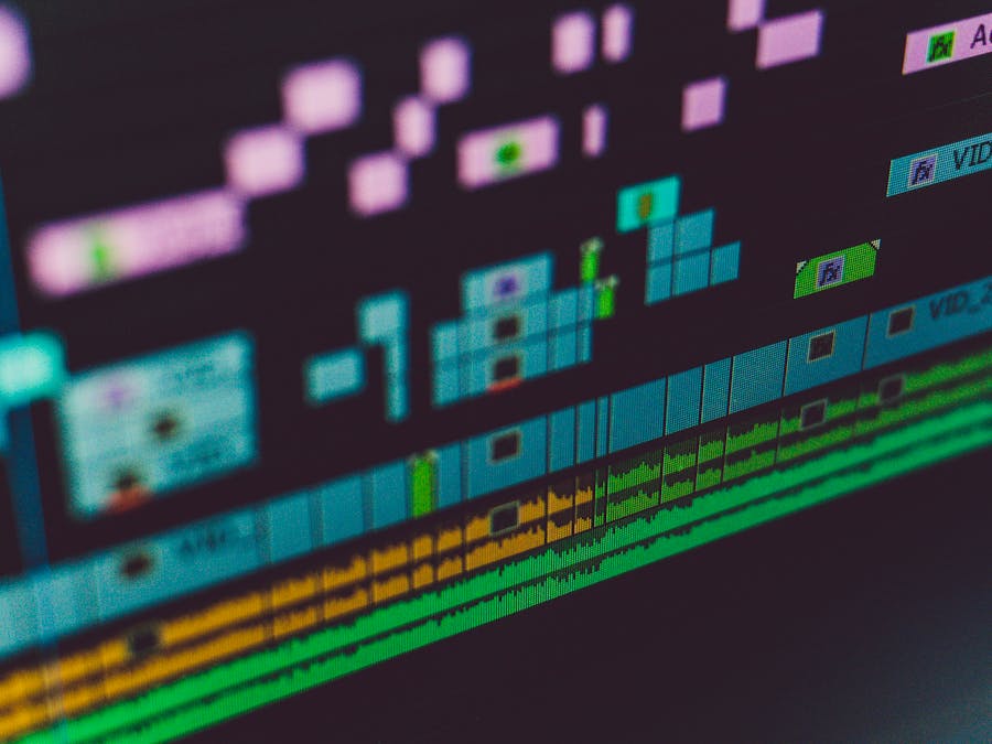 Detailed view of a video editing software interface showing multi-track timeline and colorful design.