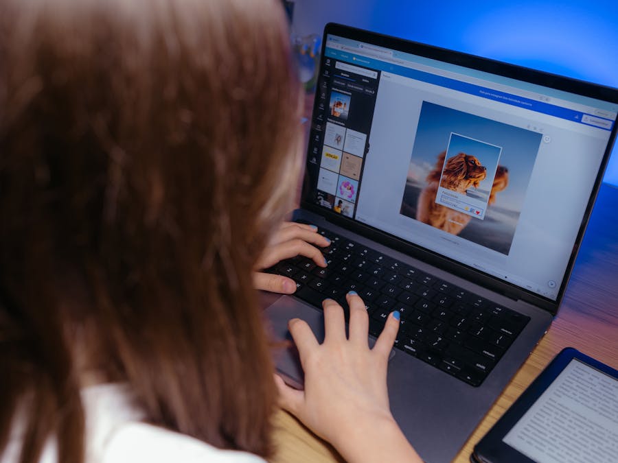 Child using a laptop for a creative design project, focused on learning and technology.
