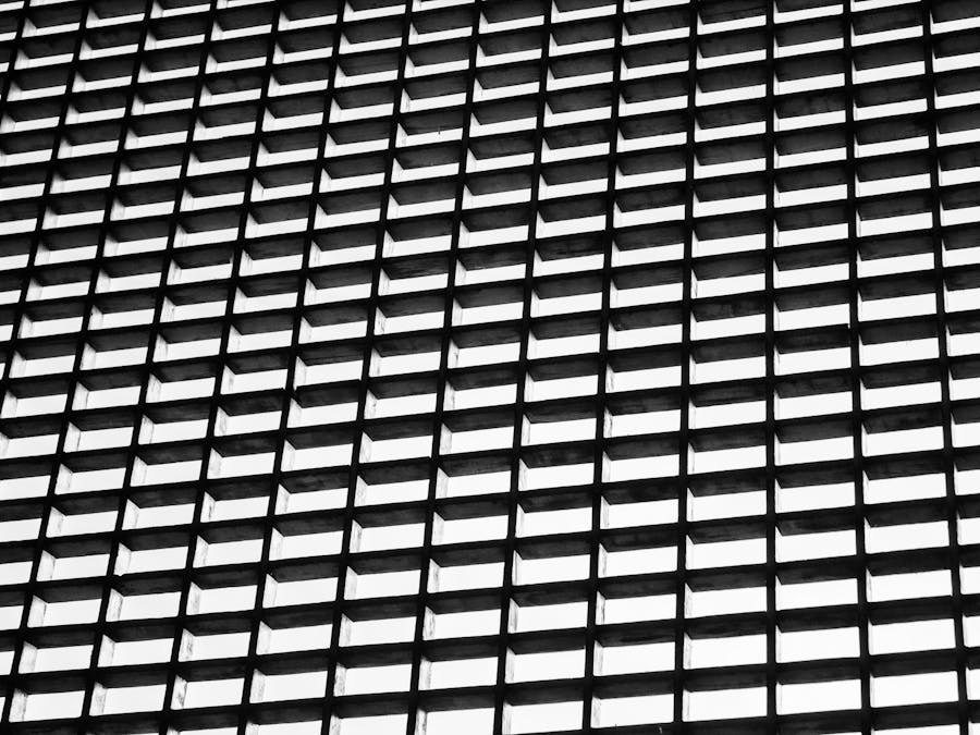 Geometric black and white grid pattern creating an abstract visual effect.