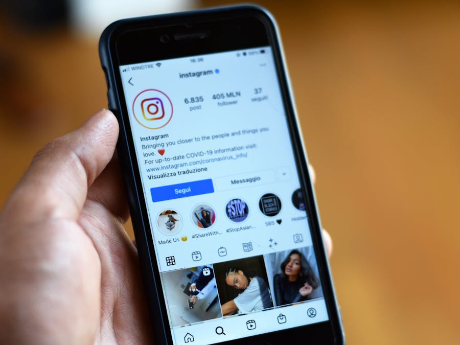 Close-up of a smartphone displaying an Instagram profile screen.