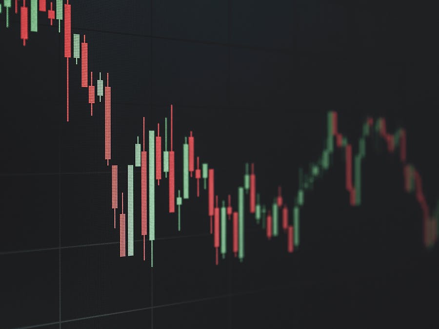 Stock market data chart showing trends in red and green. Perfect for financial and business themes.