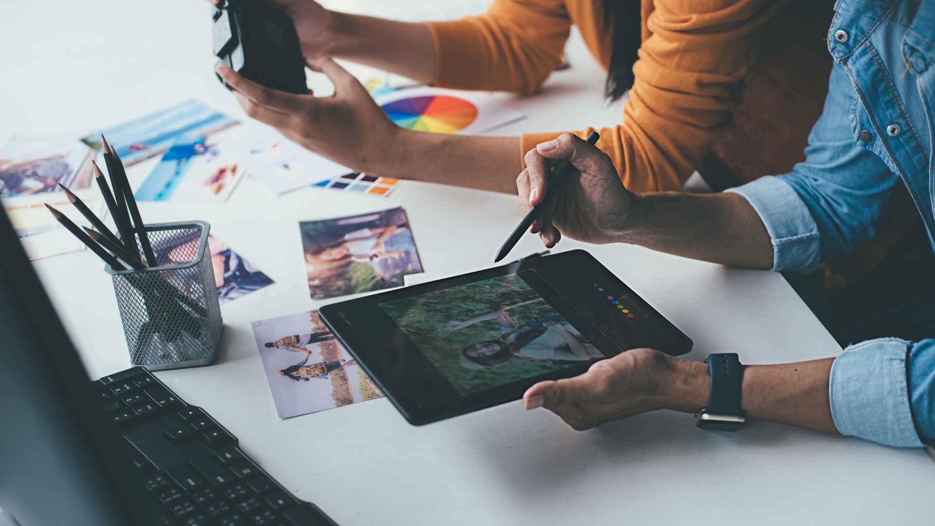 Social media agency team creating and editing digital content