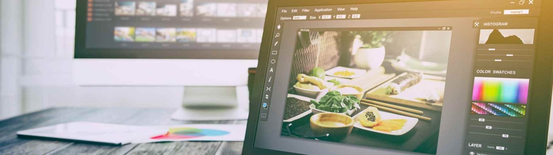 editing a photo on a laptop
