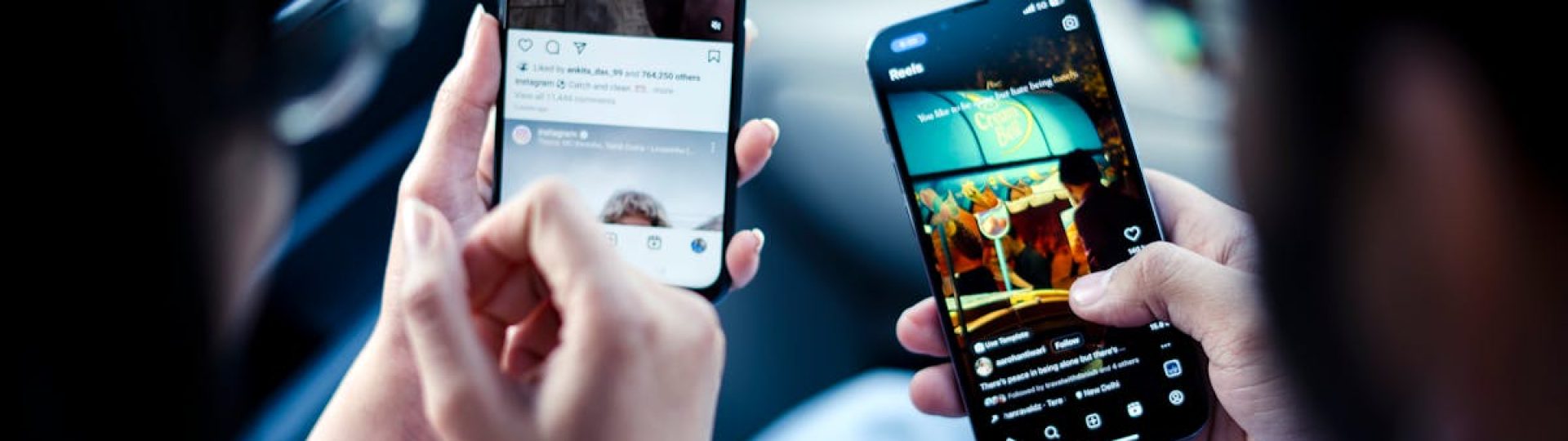 A couple engaging with social media on smartphones indoors, illustrating modern digital connectivity.